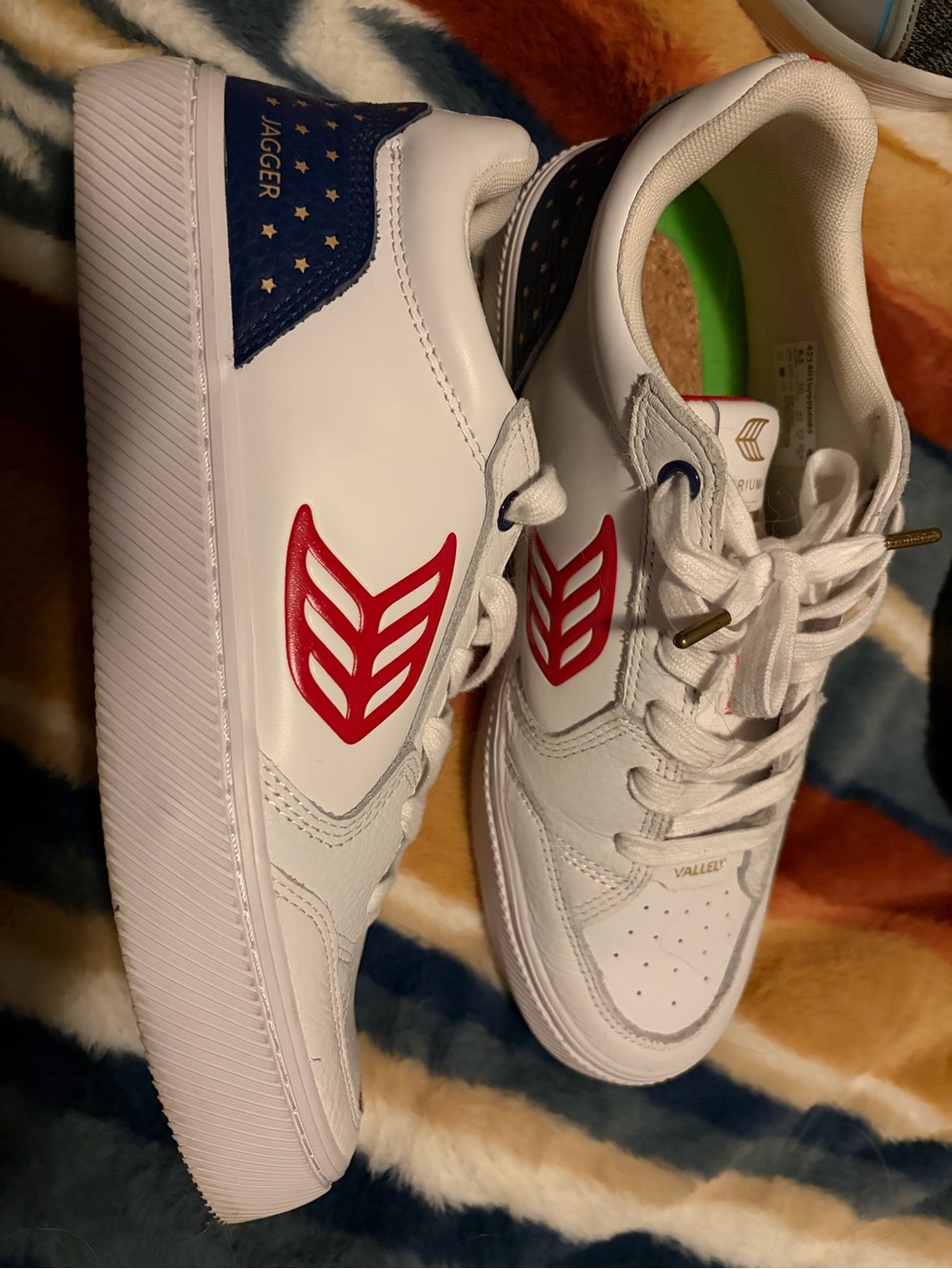 Cariuma White Sneakers with Red Accent and Blue Star Heel. Released for 2024